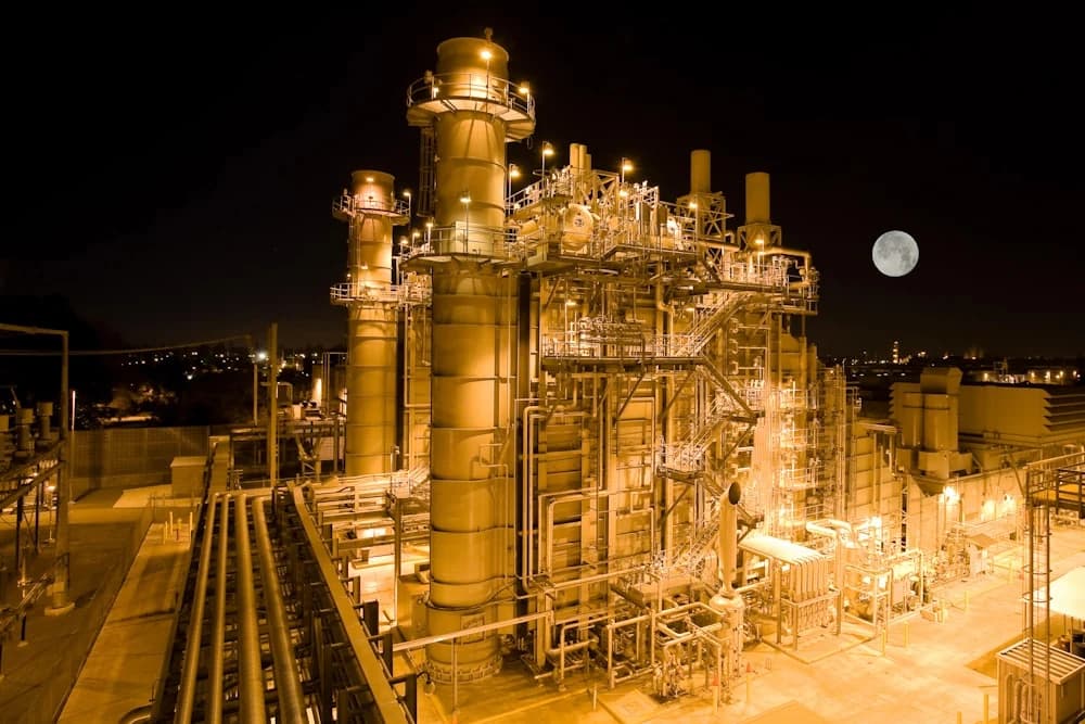 Power plant illuminated at night